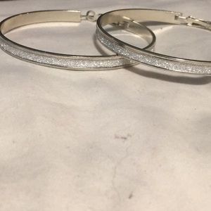 Big silver hoop earrings